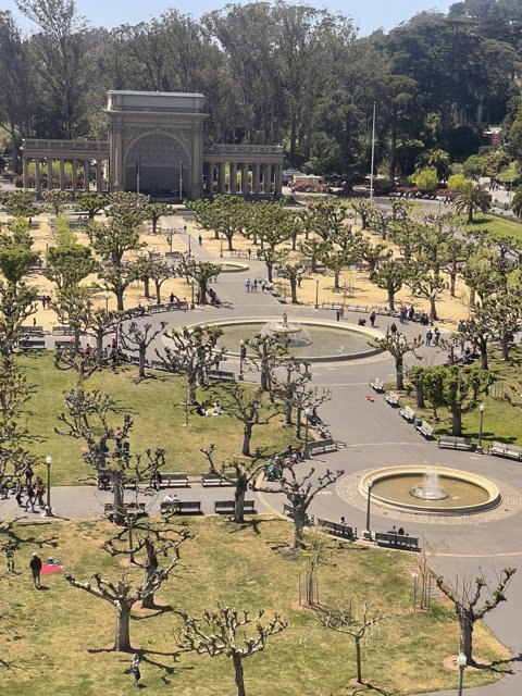 People Enjoying a Sunny Day at San Francisco's Music Concourse