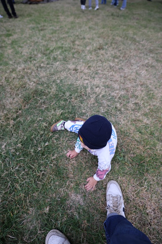 Toddler Explores Festival Grounds at Balloon Classic