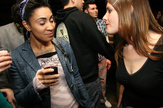 Two Women Sharing a Moment at a Party