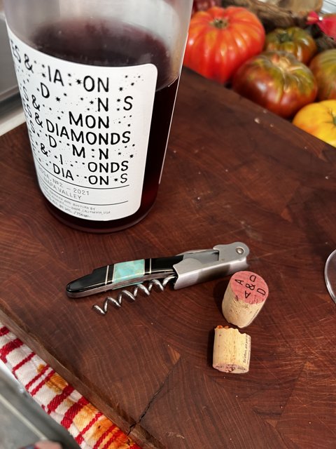 Wine and Corks on Cutting Board