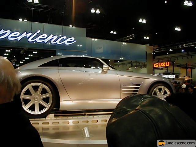 Sleek and Shiny: A Silver Sports Car at the LA Auto Show