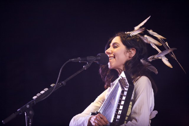 PJ Harvey Rocks Coachella Stage with Feathered Headgear