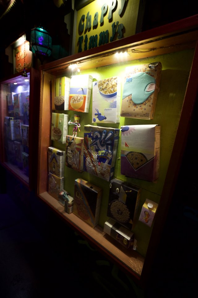 Illuminated Display Case of Vintage Cereal Boxes Collection