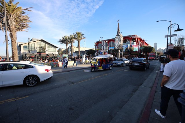 Bustling Fisherman's Wharf Waterfront at Dusk