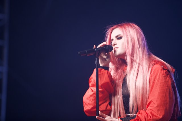 Rocking the Stage with Pink Hair