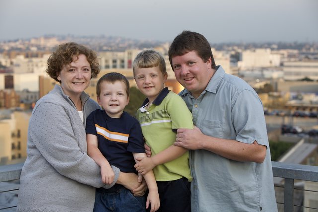 Family Portrait on Urban Rooftop at Dusk