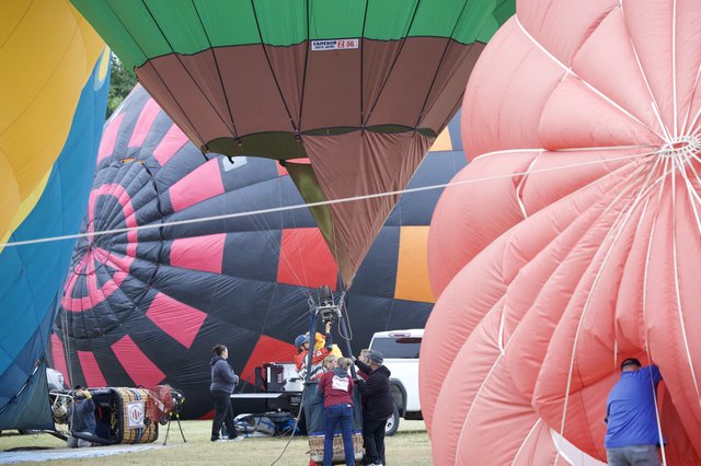 Ground Crews Inflate Balloons at Sonoma Classic
