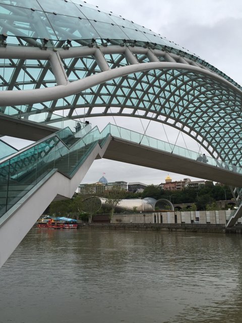 The Arch Bridge with Glass Walkway Over the Mtkvari River