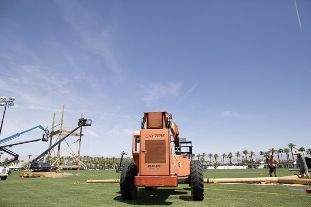 Construction Machine on a Green Field