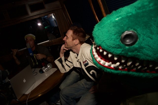 Chris Burkard with his beloved stuffed dinosaur