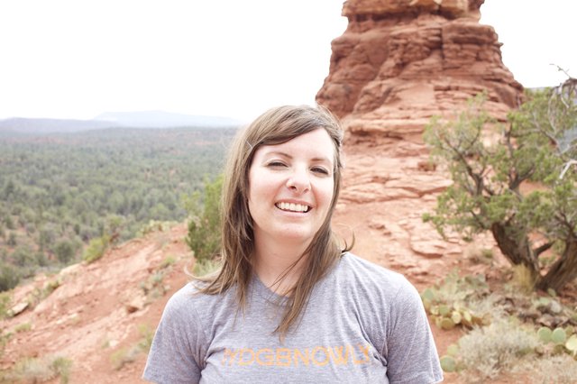 Smiling Hiker Poses Among Sedona Red Rock Formations