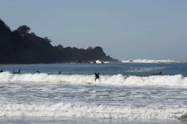 Riding Waves under the Pacifica Sky