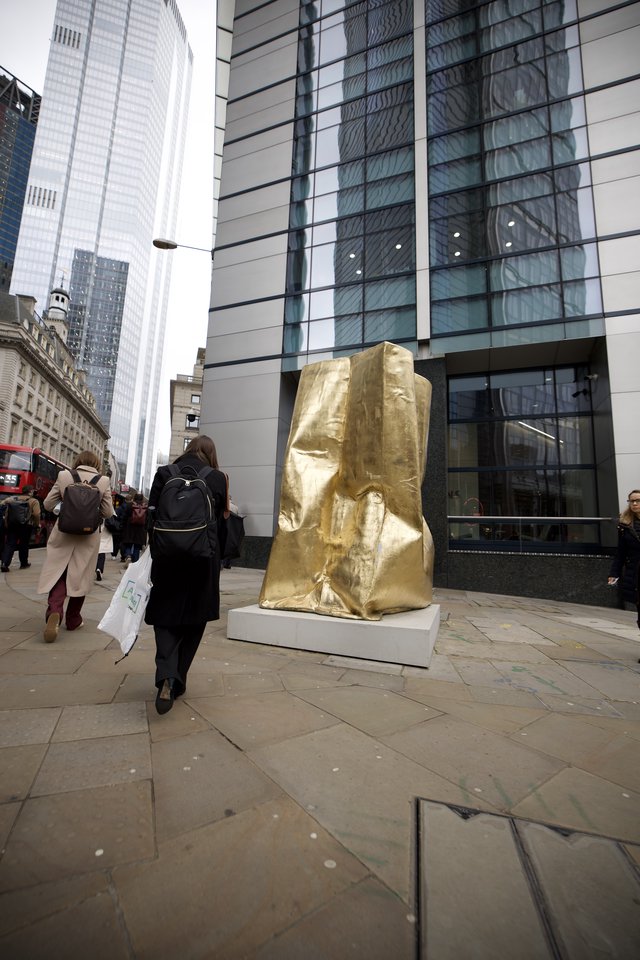 Golden Paper Bag Sculpture in London Financial District
