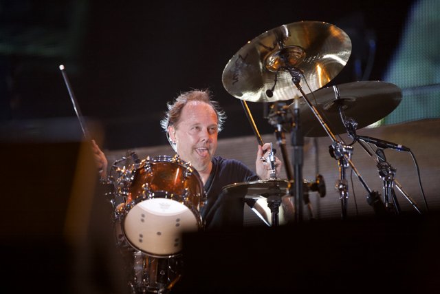 Lars Ulrich lights up the stage with his drumming skills