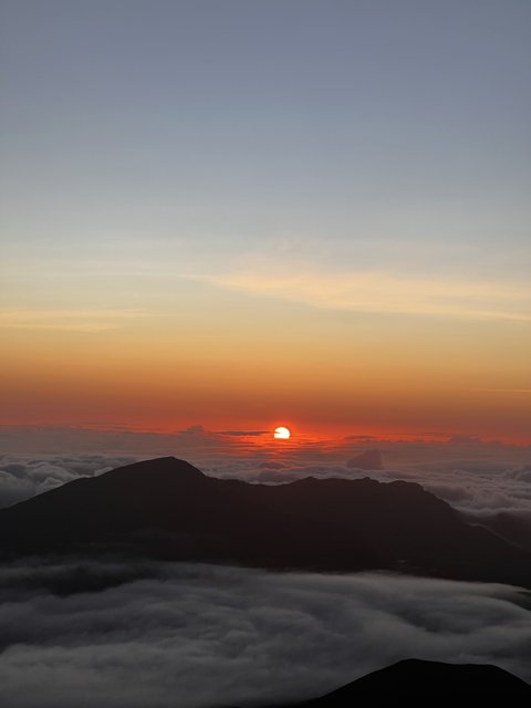 Sunrise over the Clouds