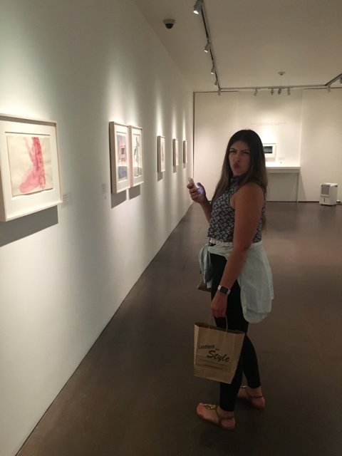 A Teen Girl Admires Art in the Georgia O'Keeffe Museum