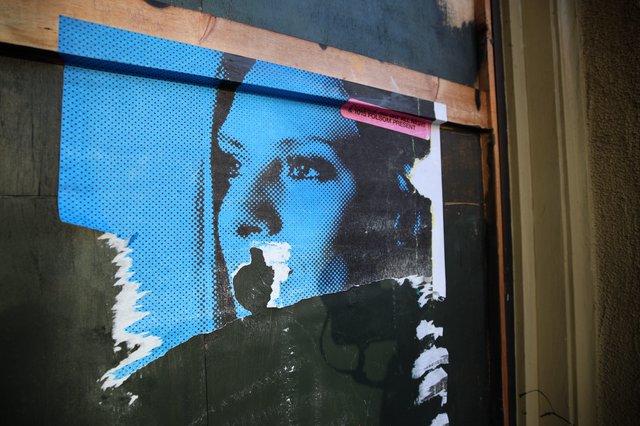 Weathered Pop Art Portrait Street Poster Installation