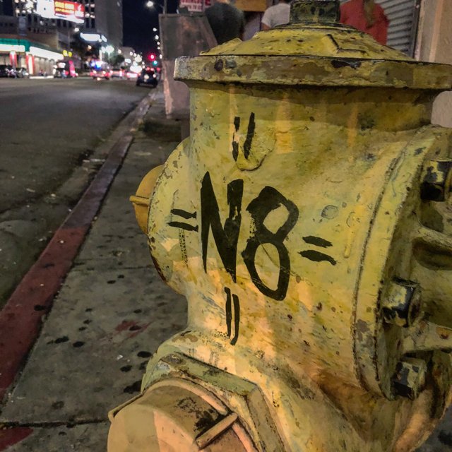 Graffiti on a Yellow Fire Hydrant