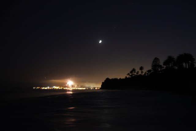 Moon and Venus Reflect in Ocean at Night