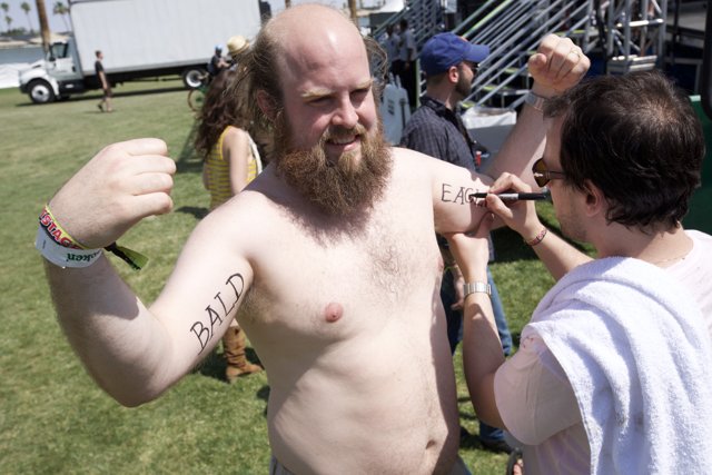 Chest Tattooed Man at Coachella