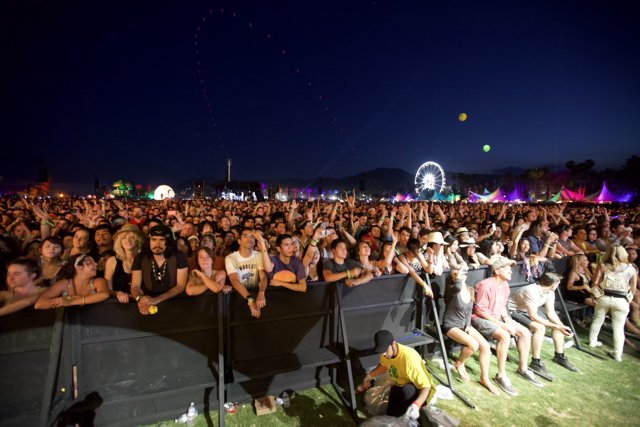 Coachella Crowd Grooving Under the Night Sky