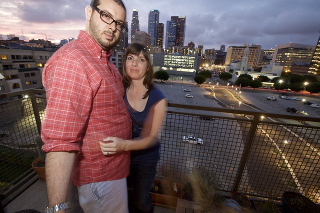 Couple's Evening Portrait with Los Angeles Downtown Skyline