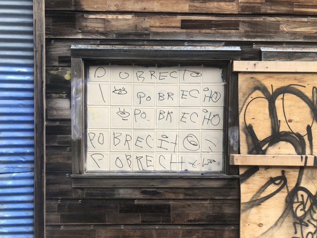 Graffiti Window with Sign