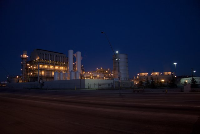 Illuminated Power Plant at Night