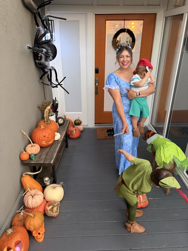 Family Halloween Celebration on Decorated Front Porch