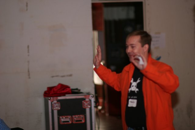 Man in Orange Jacket at Barcamp 3