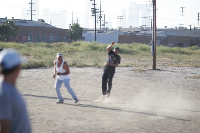 Playing Baseball on the Dirt Field