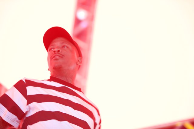 YG's Striped Shirt and Red Cap