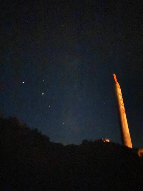 Pencil Pointing to the Starry Sky
