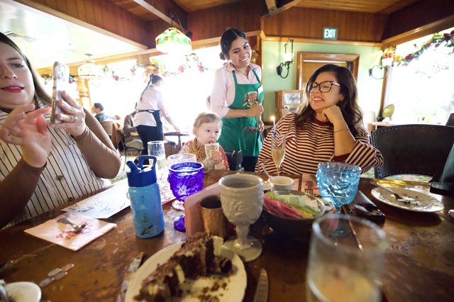 Family Celebration at Mexican Restaurant with Waitress