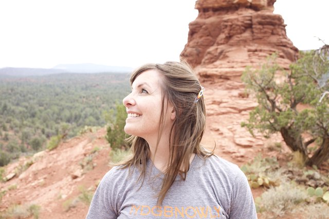 Woman Gazing Upward Among Sedona Red Rock Formations