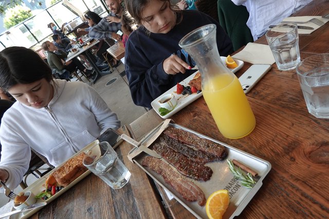 Family Brunch with Sausages and Orange Juice