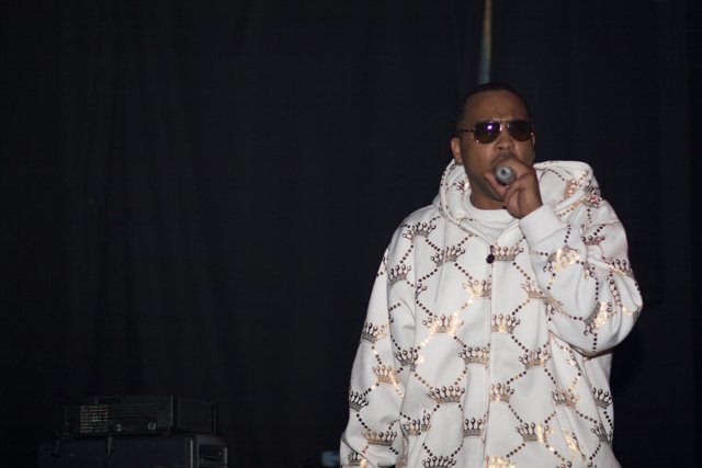 Solo Performance in Knitwear and Sunglasses