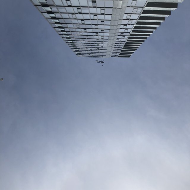 City Skyscraper and Airplane