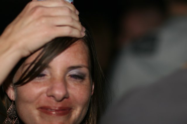 Tearful Woman at Late Night Party Event