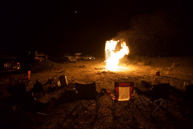 Desert Bonfire under the Starry Night Sky