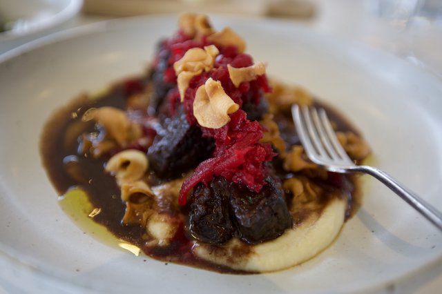 Gourmet Short Ribs with Crispy Garnish and Cream
