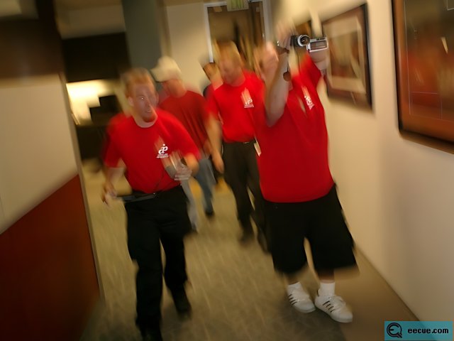 Red-Shirted Men in Motion