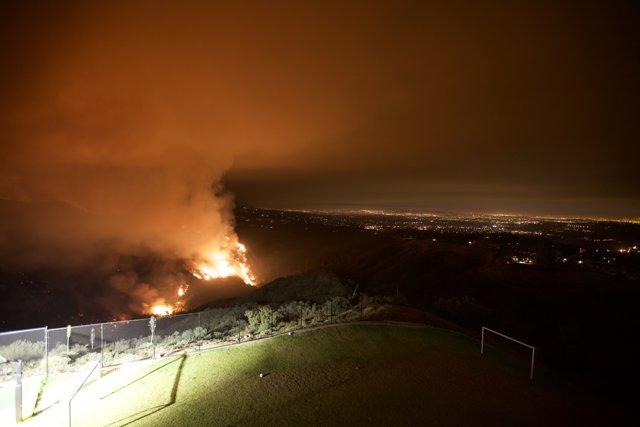 Nighttime Flames Engulf Hills in Station Fire