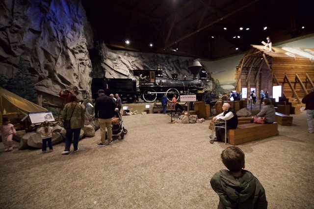 Historic Steam Locomotive Display in Museum Cave Setting
