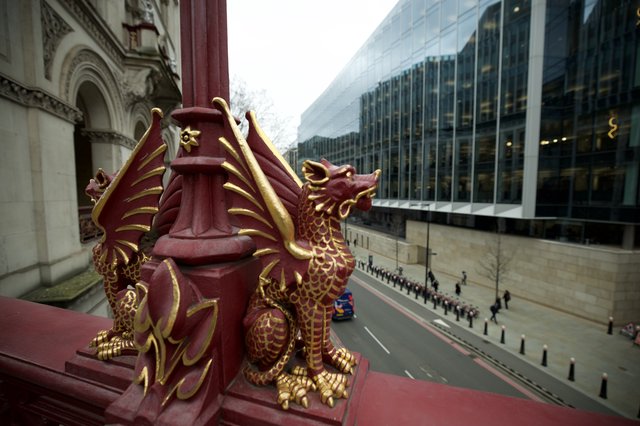 Red Dragon Guardian Overlooking London Street