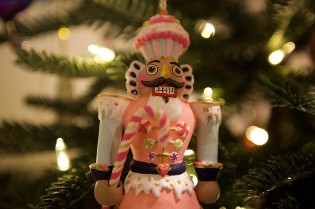 Whimsical Nutcracker Ornament on Decorated Christmas Tree