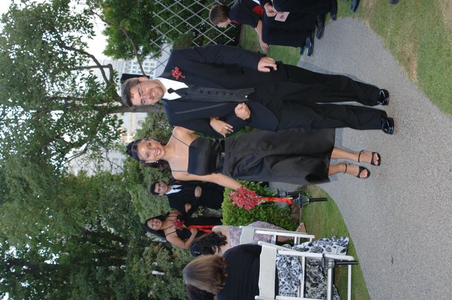 Joyful Couple Walks the Aisle at Outdoor Wedding