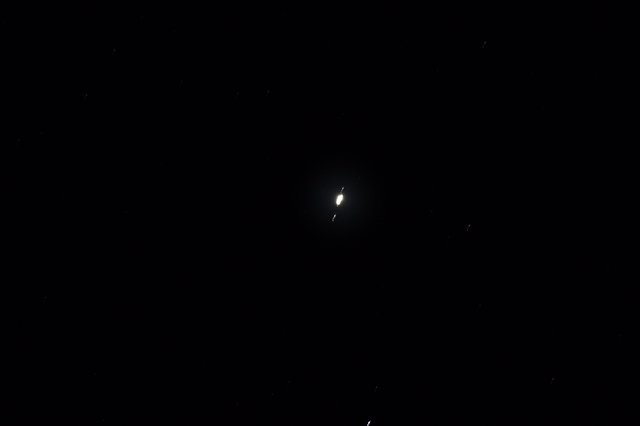 Jupiter and Its Galilean Moons in Night Sky