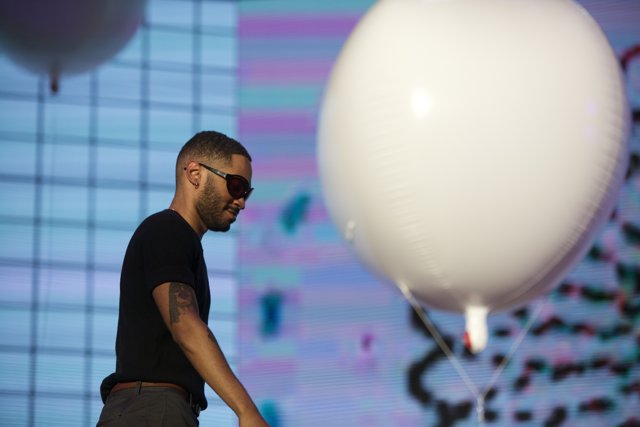 The Cool Kaytranada with a Huge White Sphere Balloon