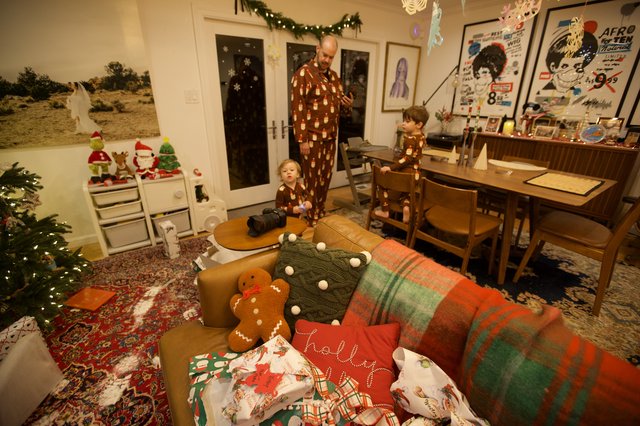 Family Christmas Morning in Festive Living Room
